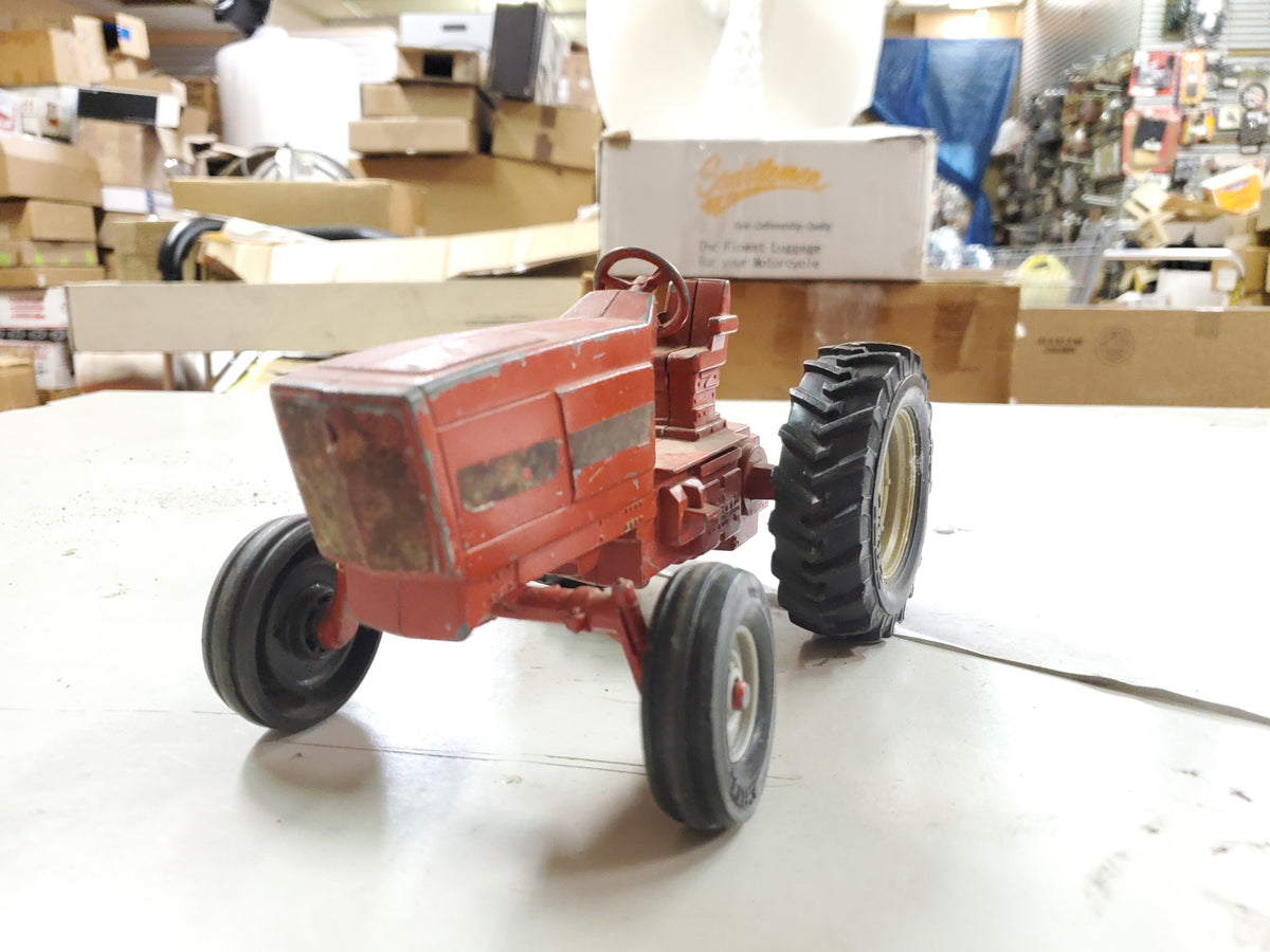 Vintage The Ertl red international tractor tin toy tractor