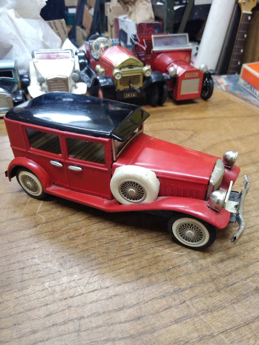 Antique friction toy sales cars