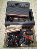 Atari 2600 Woodgrain Console Lot Storage Case 6 Controllers 25 Games Manuals