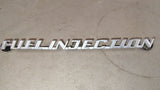 1975-1979 VW Beetle Bug Fuel Injection Rear Decklid Script Emblem OEM 133853687