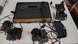 Vintage Atari 2600 4-Switch Woodgrain Console Bundle With Controllers Touch Pad