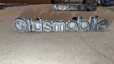 1981-1984 Oldsmobile Grille Script Emblem Pair OEM GM 22507496 Delta 88 98