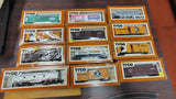 Vintage Tyco HO Scale Train Lot: 11 Boxed Cars, Santa Fe Engine, Tracks, Bridg