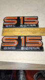 Pair 1985-1990 GMC Sierra S15 Fender Emblems Badges OEM 15592833