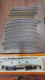 Vintage Tyco HO Scale Train Lot: 11 Boxed Cars, Santa Fe Engine, Tracks, Bridg