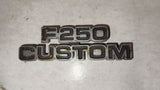 1977-1979 Ford F250 Custom Cowl Fender Emblem OEM D7TB-16702-FWC D7TZ-16720-P