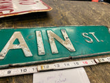 Vtg Embossed Main Street sign Tin Auto Truck Oil Gas Man Cave GArage Decor 24"