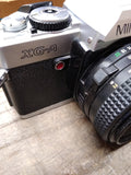 Vtg Minolta XG A 35mm SLR Film Camera with MD 50mm 1:1.7 lens Strap Case