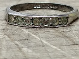 Vtg 925 Sterling Silver Ring w/7 Round Clear Unknown Stones Size 8 Tested!