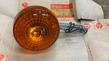 NOS OEM SUZUKI TS GS 250 400 550 750 1000 110 FRONT TURN SIGNAL LAMP 35601-29620