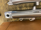 New T/O Fork Lower Legs Sliders Harley Touring FLH Glide Ultra Classic 2000^
