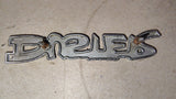1972-1976 Plymouth Duster OEM Fender Emblem Script Mopar 3680304 46430
