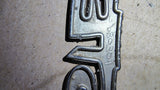 1972-1976 Plymouth Duster OEM Fender Emblem Script Mopar 3680304 46430