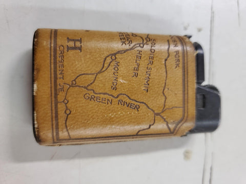Brown Leather wrapped lighter with the map of Utah on it works made in France