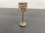 ANTIQUE METAL SPEED LIMIT 50 SIGN. MEASURES 1"BY 3"-GREAT, UNIQUE PIECE TRAIN