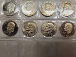 '71-'78 Lot 32 Eisenhower Dollars Uncirculated Including Proofs & Silver coins