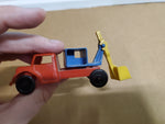 VINTAGE WANNATOYS MADE IN U.S.A. RED YELLOW AND BLUE BACKHOE TRUCK