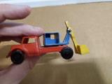 VINTAGE WANNATOYS MADE IN U.S.A. RED YELLOW AND BLUE BACKHOE TRUCK