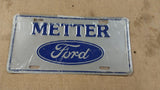 Vtg Blue Grey Metter Ford Logo Truck License Plate Tin Man Cave 94A-0096