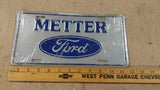 Vtg Blue Grey Metter Ford Logo Truck License Plate Tin Man Cave 94A-0096