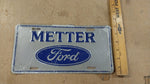 Vtg Blue Grey Metter Ford Logo Truck License Plate Tin Man Cave 94A-0096