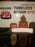 Vtg Adams PSP Tubeless Tire Repair System Kit Wall Mount Tin Advertising Sign