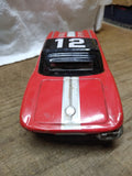 Vtg 1960's Cragstan Chevrolet Corvette #12 Champion Pure Friction Litho Toy Car