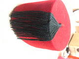 Maroon Wool Fez with Black Tassel weaving on the inside with Tarbouche Moulouki