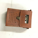 Bulova Transistor 660 series battery operated pocket Radio w/ brown Leather case