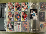 VTG Binder Full of 100+ 1990s NFL,NHL,NBA,MLB Trading Cards Larry Bird & more