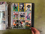 VTG Binder Full of 100+ 1990s NFL,NHL,NBA,MLB Trading Cards Larry Bird & more