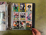 VTG Binder Full of 100+ 1990s NFL,NHL,NBA,MLB Trading Cards Larry Bird & more
