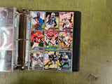 VTG Binder Full of 100+ 1990s NFL,NHL,NBA,MLB Trading Cards Larry Bird & more
