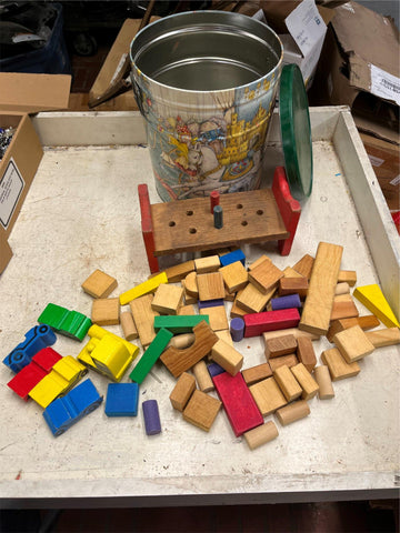 Tin container full of vintage wooden blocks and shapes childrens toys