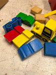 Tin container full of vintage wooden blocks and shapes childrens toys