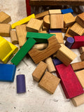 Tin container full of vintage wooden blocks and shapes childrens toys