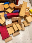 Tin container full of vintage wooden blocks and shapes childrens toys