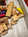 Tin container full of vintage wooden blocks and shapes childrens toys
