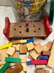 Tin container full of vintage wooden blocks and shapes childrens toys