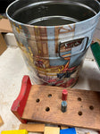Tin container full of vintage wooden blocks and shapes childrens toys