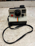 vtg Polaroid One Step Land Camera with strap rainbow stripe