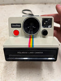 vtg Polaroid One Step Land Camera with strap rainbow stripe