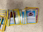 Bag full of 70+ pokemon cards various colors and characters