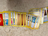 Bag full of 70+ pokemon cards various colors and characters
