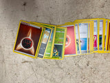 Bag full of 70+ pokemon cards various colors and characters