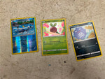 Bag full of 70+ pokemon cards various colors and characters