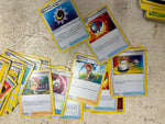 Bag full of 70+ pokemon cards various colors and characters