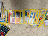 Bag full of 70+ pokemon cards various colors and characters
