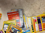 Bag full of 70+ pokemon cards various colors and characters