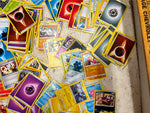 Bag of 80+ Pokémon Cards: Various Generations, colors, and characters